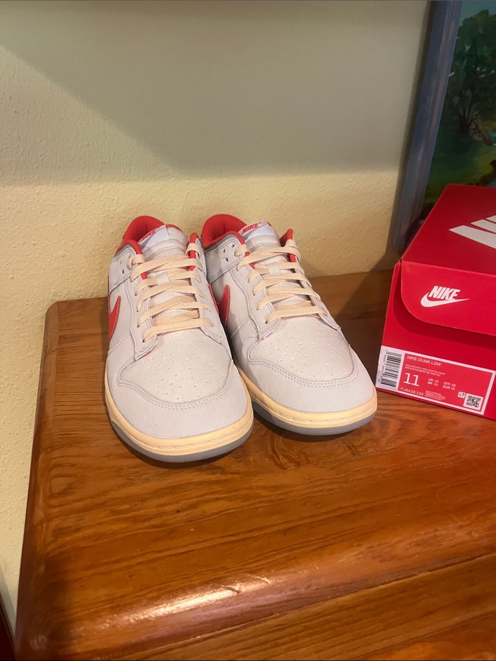 Nike Men’s Low-Top Sneakers in Cream with Red Accents